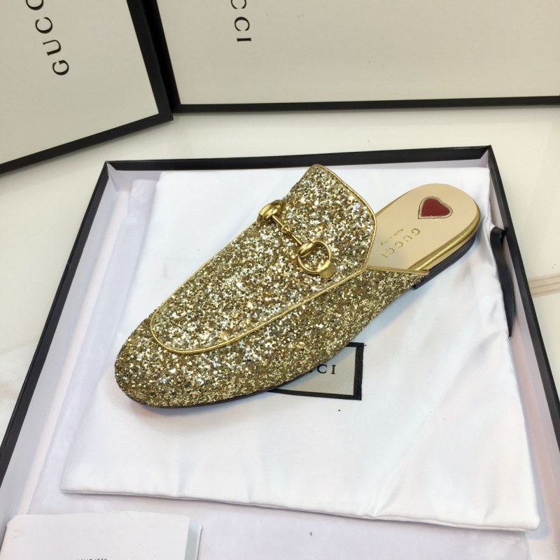G*u*i slippers
